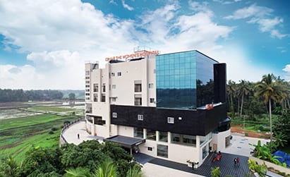 CIMAR Thrissur hospital surrounded by paddy fields